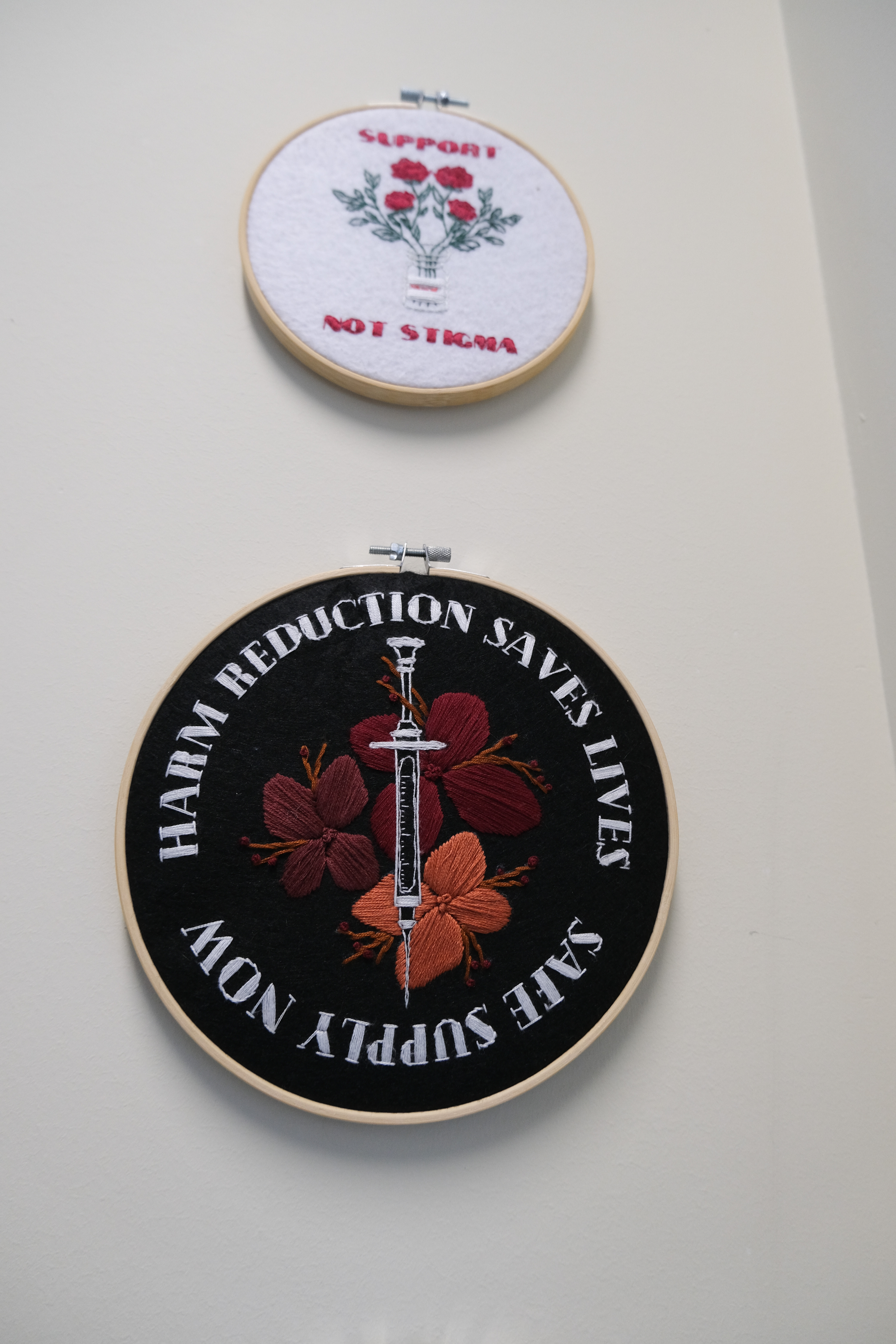 Artwork on the walls in Waraksa's office reinforces the importance of a harm reduction approach to care.