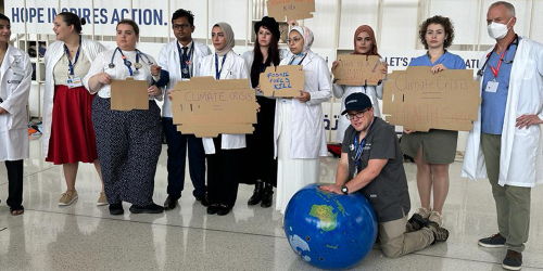 Rob Samulack participates in stunt at COP28 in Dubai