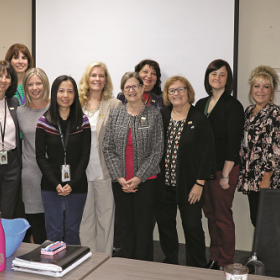 On Oct. 5, RNAO CEO Doris Grinspun (centre, grey jacket) visited nursing staff at the Windsor-Essex County Health Unit with RNAO’s Region 1 board representative Betty Oldershaw (fourth from right) and Windsor-Essex Chapter president Crystal Hepburn (far left). From left to right: Theresa Marentette, Nicole Dupuis, Lindsay Borg, Lihn Drexler, Leanne Paquette, Joanne Hegazi (behind Grinspun), Kelly Samms (third from right), Barb Deter and Shannon Gagnier. 