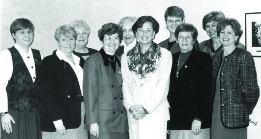 Celebrating NP legislation with then health minister Elizabeth Witmer (front row, third from right) are  (L to R): Carol Sargo, past president, NPAO, Joanne Mousseau, former nursing consultant to the ministry of health on the NP initiative, Barbara Thornber, ED, RPNAO, Charlotte Noesgaard, RNAO president, Margaret Risk, ED, CNO, Sue Williams, director of the school of nursing at Ryerson Polytechnic University, Petra Cooke, president, CNO, Barb Wahl, president, ONA, and Doris Grinspun, ED, RNAO. 