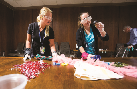 McMaster nursing students Kylie Drohan (right) and Jessica Foisey participate in a virtual aging and dementia simulation at the Greater Niagara General Hospital in June.