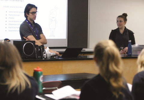 Nipissing University nursing students Jacob Belanger (left) and Selena Sciuk talk about concussions with Grade 12 biology students at North Bay’s St. Joseph-Scollard Hall high school in February. 