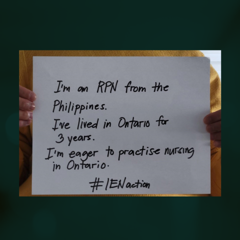 Person holding sign that says "I'm an RN from the Phillipines. I've lived in Ontario for 3 years. I'm eager to help and to practise nursing in Ontario. #IENAction