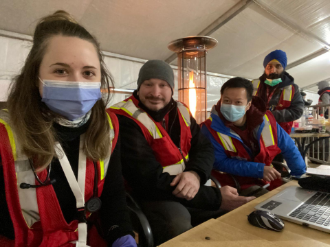 Team Alpha staying warm on the night shift at the Krakovets, UA/ Korczowa, PL border.  L-R RN Jordan Lenz, RN Brandon Duncan, Dr. Anthony Fong, RN Ameek Singh. 