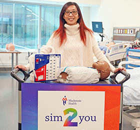 Christina Scerbo with SIM cart, courtesy of Mackenzie Health