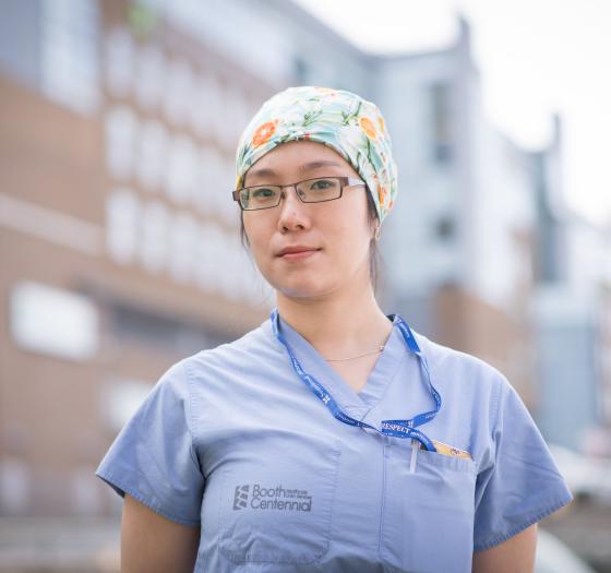 Clarice Shen in front of Sunnybrook Health Sciences Centre