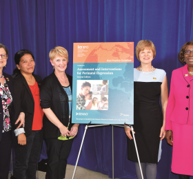 RNAO Region 7 board representative Llamo Dolkar and BPG panel member Sue Bookey-Bassett shared their lived experiences with perinatal depression. Also at the podium were: (left) Doris Grinspun, RNAO CEO; and (right and second from right, respectively) RNAO President Angela Cooper Brathwaite and Katherine Wallace, the RNAO manager who led the development of the guideline.