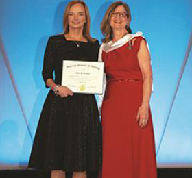 RNAO CEO Doris Grinspun (right) inducted as an honourary academy fellow of the American Academy of Nursing