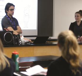 Nipissing University nursing students Jacob Belanger (left) and Selena Sciuk talk about concussions with Grade 12 biology students at North Bay’s St. Joseph-Scollard Hall high school in February. 