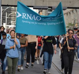 RNAO members Elaine Wang (left) and Nicole Deziel (right) hoist the RNAO banner as they march with thousands of other Torontonians concerned about the future of our planet. The rally – or Climate Strike as it was called – took place in cities across the country on Sept 27. Other RNAO members, including staff, joined what RNAO CEO Doris Grinspun referred to as “…the most important fight of our generation for the health and very existence of future generations.”